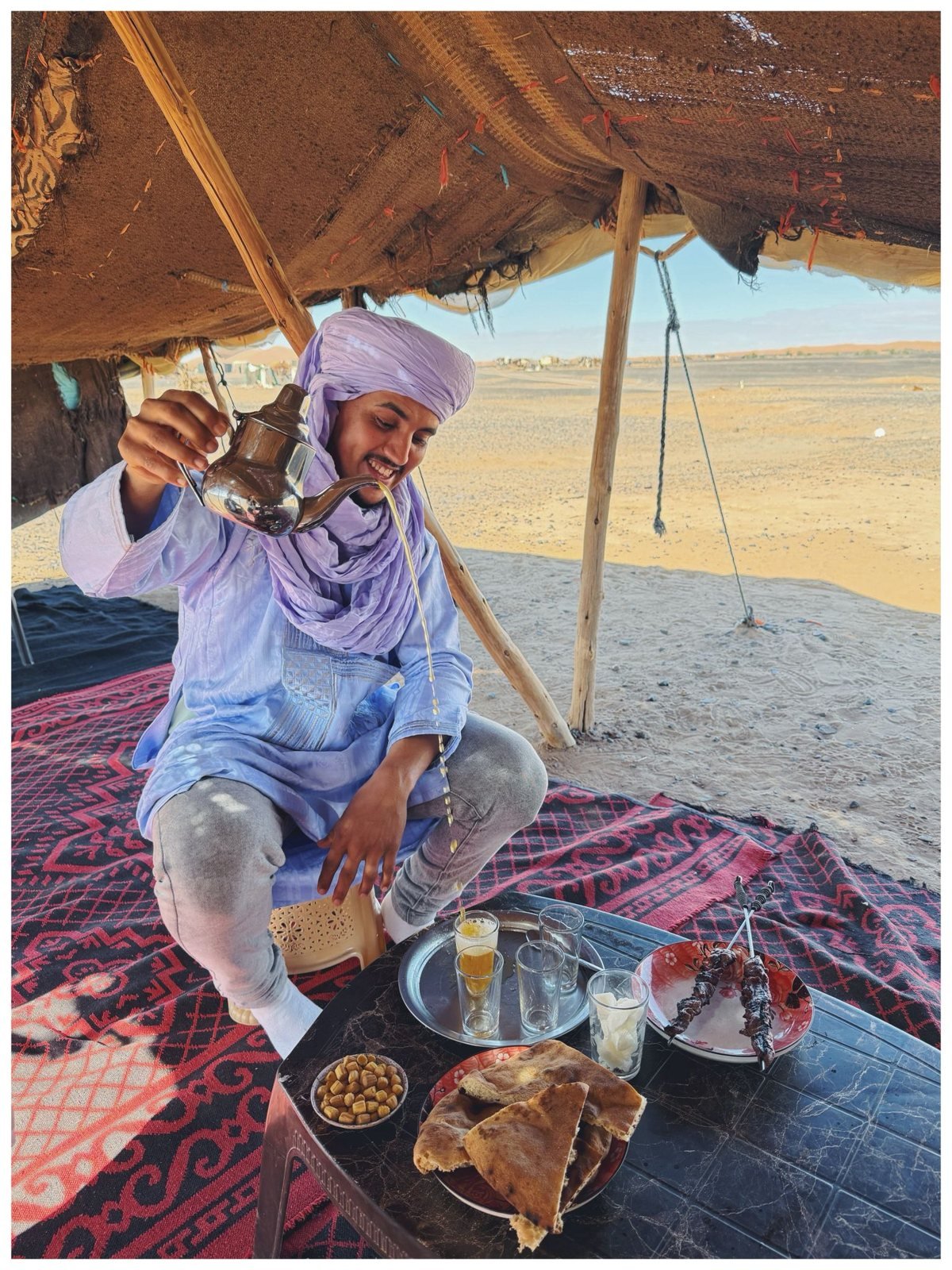 Mint tea for guests in a desert tent