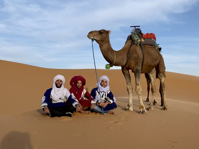 Moroccan people welcoming a guest