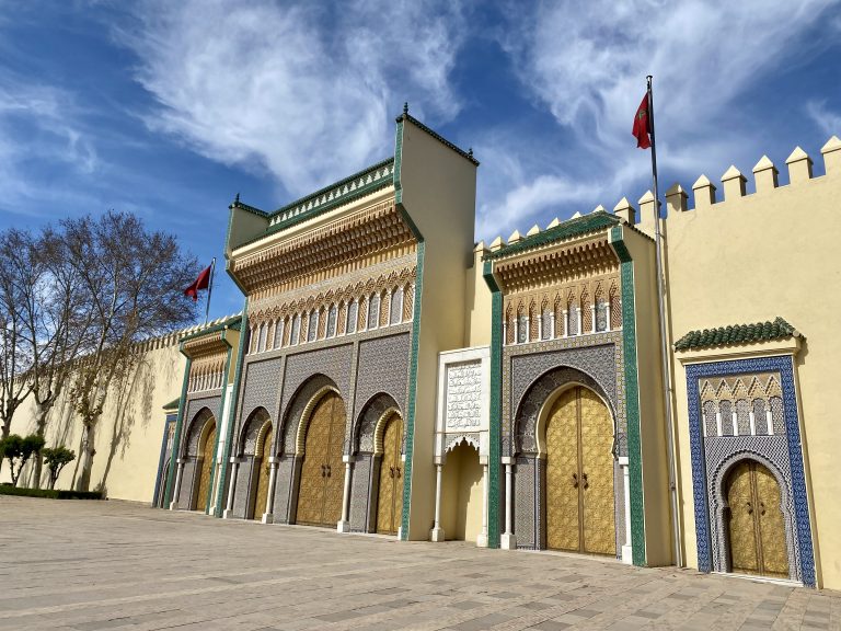 The Royal Family of Morocco posing at a royal event, including King Mohammed VI, Crown Prince Moulay Hassan, and royal sisters.
