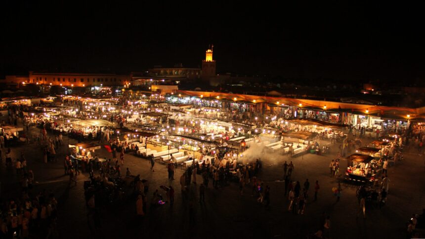 Is Marrakech Safe at Night? Jemaa el-Fnaa Square at night in Marrakech with lights and crowds